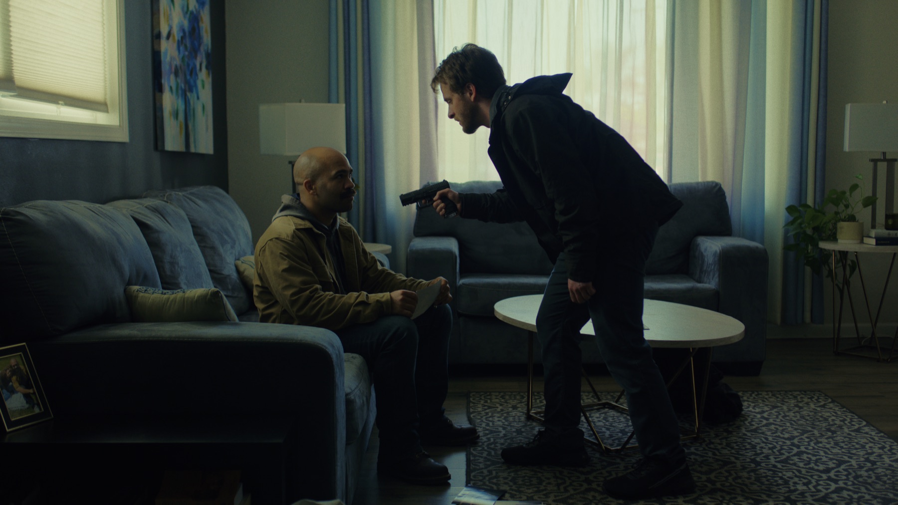Eric and Trevor confronting each other